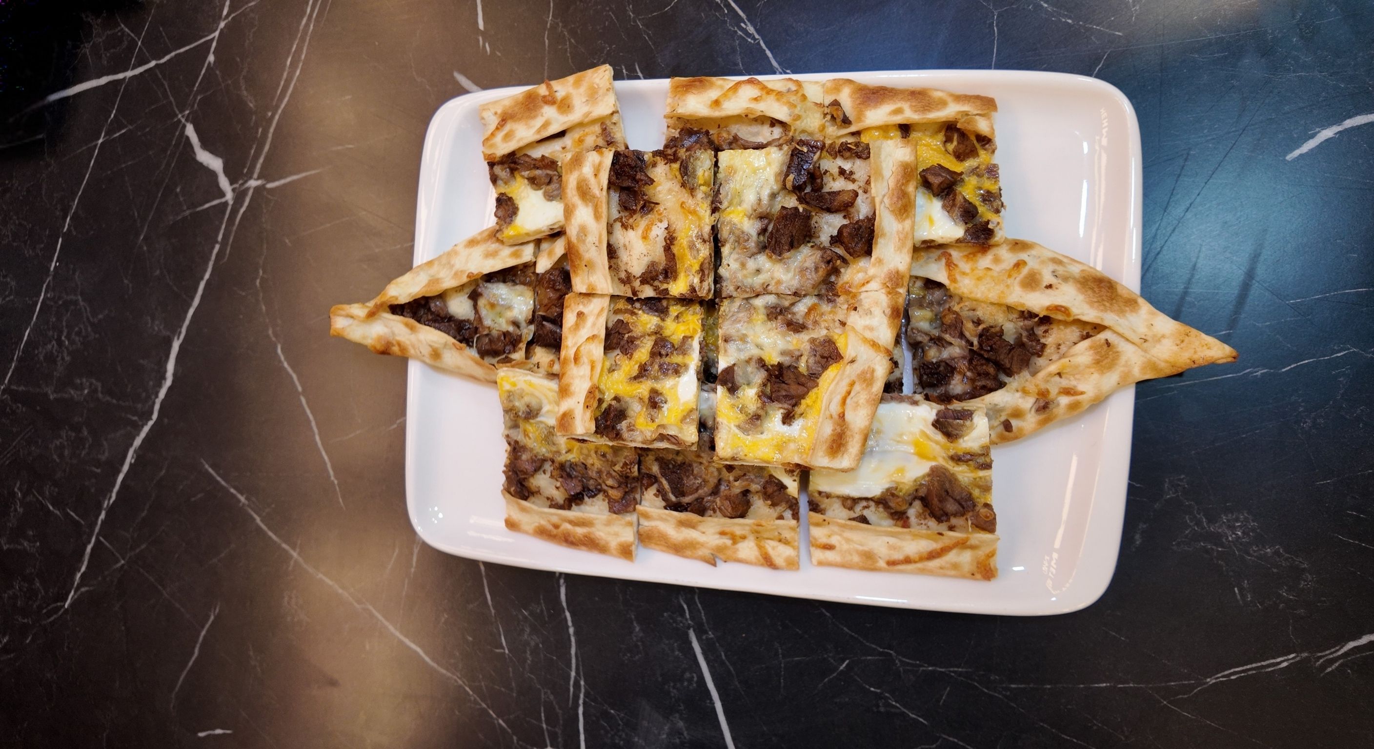 kavurmalı pide, pide çeşitleri, taş fırın pide, etli pide, diyarbakır pide, kavurma, fırın lezzeti, pide